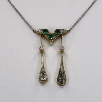 Gold colier with emerald and diamond